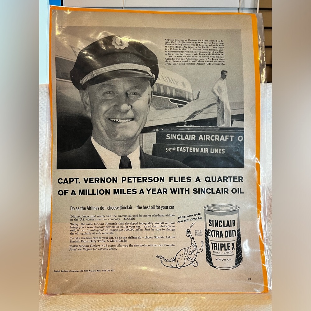 1957 Vintage Ad for Sinclair Extra Duty Motor Oil.